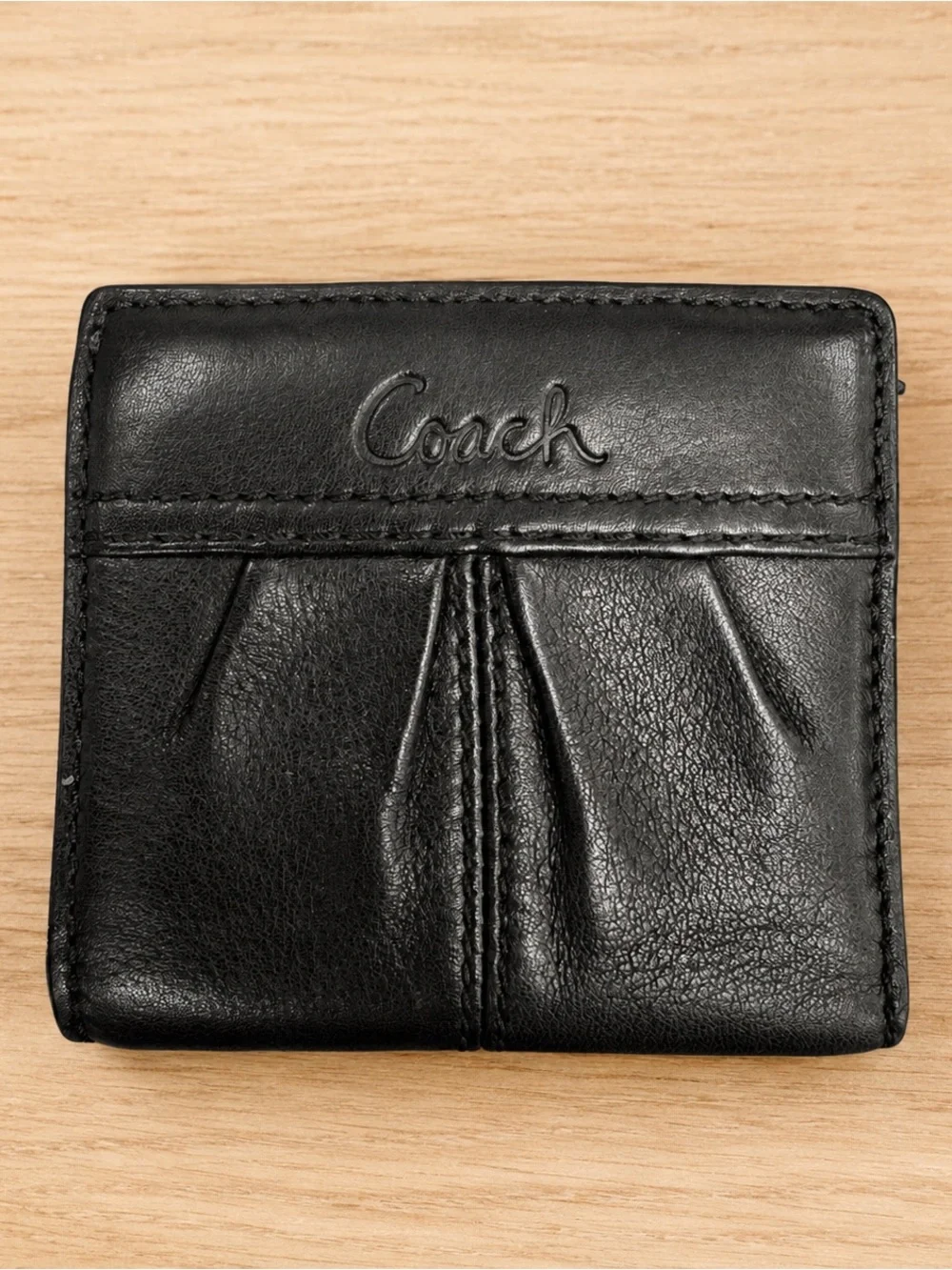 Coach Black Leather Compact Wallet with Embossed Logo